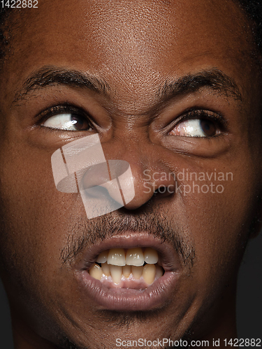 Image of Close up portrait of young african-american man