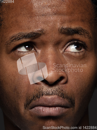 Image of Close up portrait of young african-american man