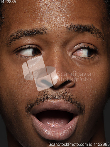 Image of Close up portrait of young african-american man