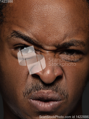 Image of Close up portrait of young african-american man