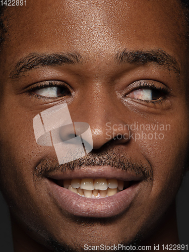 Image of Close up portrait of young african-american man