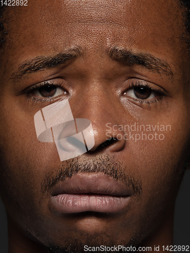 Image of Close up portrait of young african-american man