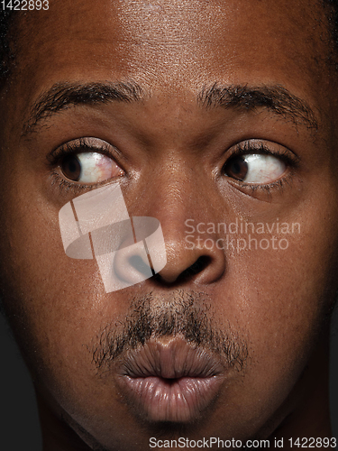 Image of Close up portrait of young african-american man