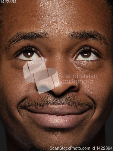 Image of Close up portrait of young african-american man