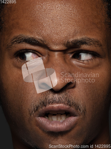 Image of Close up portrait of young african-american man