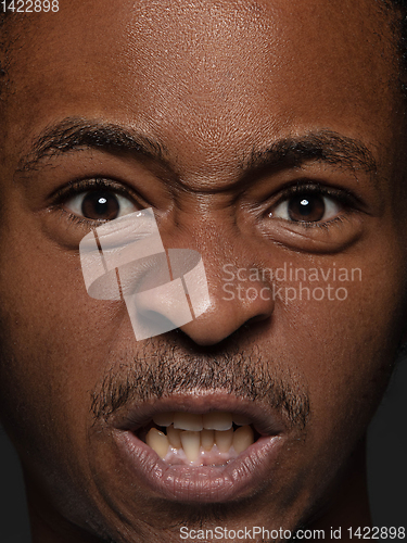 Image of Close up portrait of young african-american man