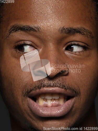 Image of Close up portrait of young african-american man