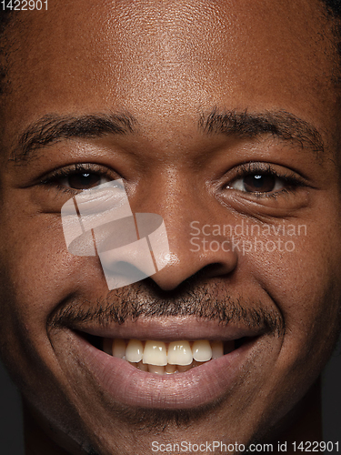 Image of Close up portrait of young african-american man