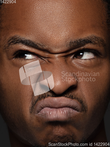 Image of Close up portrait of young african-american man