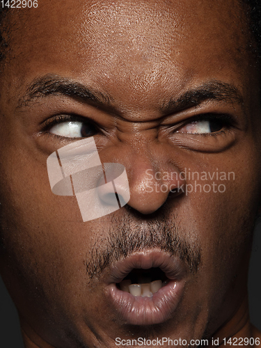 Image of Close up portrait of young african-american man