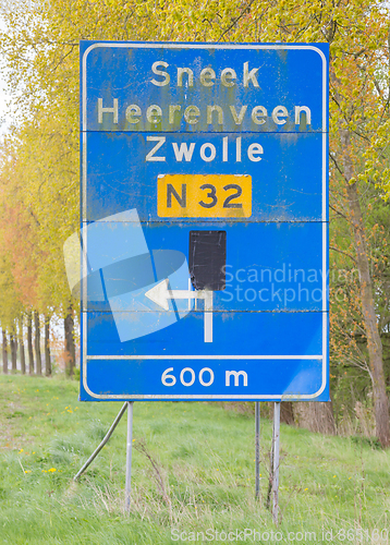 Image of Large traffic sign on a abandoned road