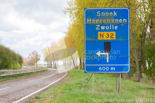 Image of Large traffic sign on a abandoned road