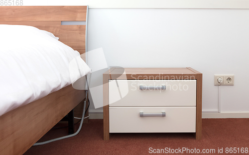 Image of Bed and bedside table