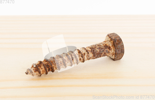 Image of Rusted old screw isolated
