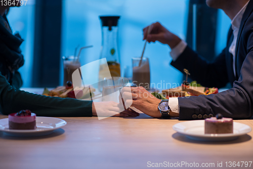 Image of loving couple enjoying romantic dinner