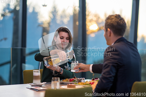 Image of loving couple enjoying romantic dinner