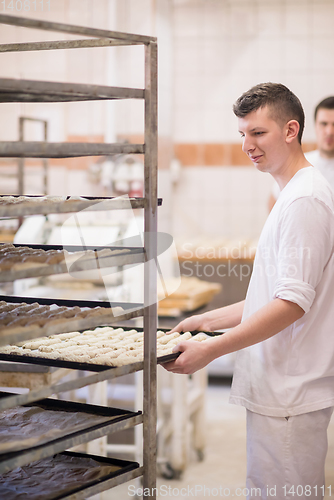 Image of bakers preparing the dough