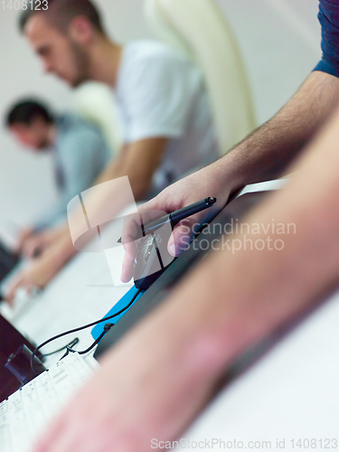 Image of Closeup of Graphic Designer Working at Workplace