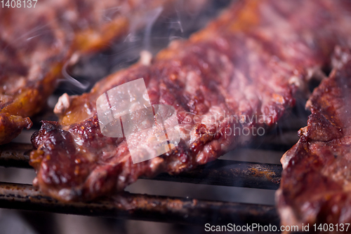 Image of delicious grilled meat on barbecue