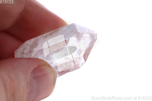 Image of crystal in the human hand