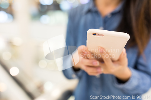 Image of Woman use of mobile phone