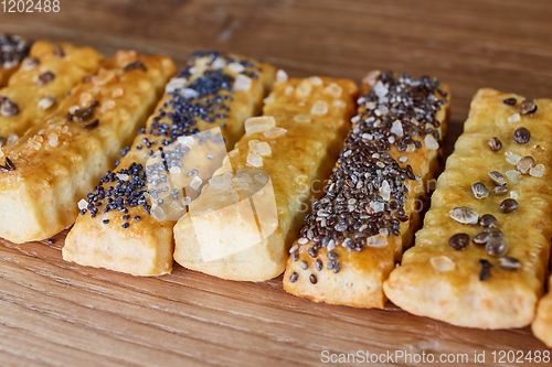 Image of baked sticks with caraway, poppy, chia seeds, salt