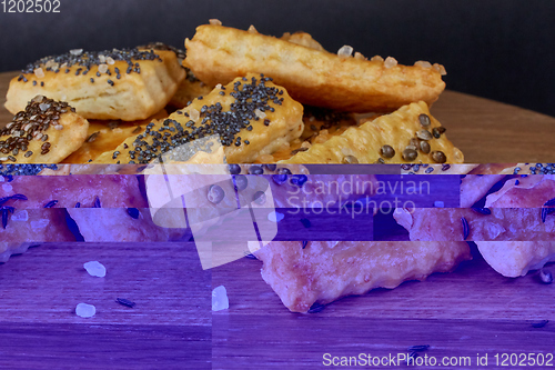 Image of baked sticks with caraway, poppy, chia seeds, salt