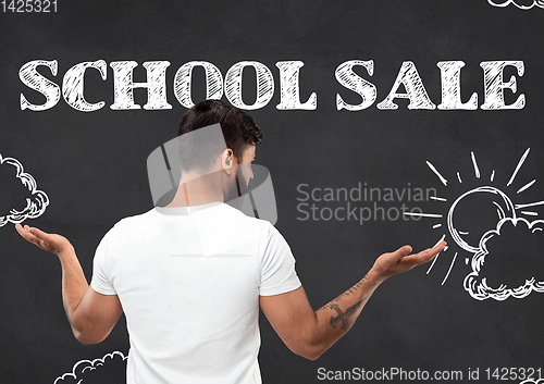 Image of Half-length close up portrait of young man, school sale