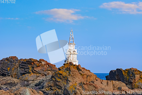 Image of Small Lighthouse on the Shore