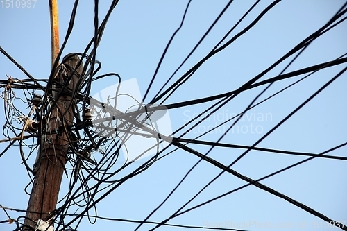 Image of A tangle of electricity and communications cables, television aerials, satellite dishes in Prizren