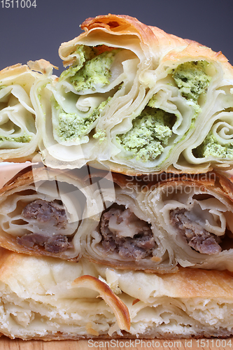 Image of Burek (pie with meat, cheese or spinach) is traditional Balkan meal