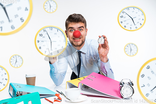 Image of Young office man celebrating red nose day