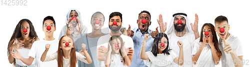 Image of Portrait of young people celebrating red nose day on white background