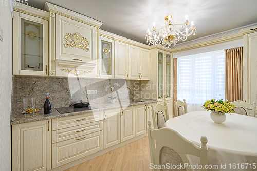 Image of Luxury modern neoclassic beige kitchen interior