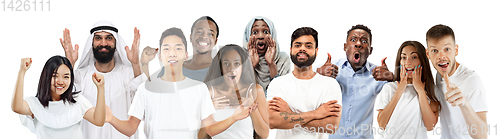 Image of Portrait of young people looks astonished and happy on white background