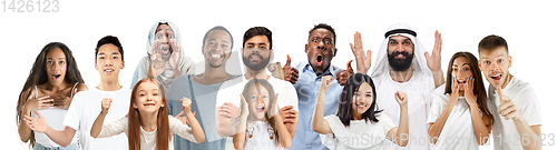 Image of Portrait of young people looks astonished and happy on white background