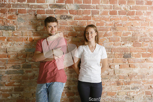 Image of Young couple preparing for doing apartment repair together themselves