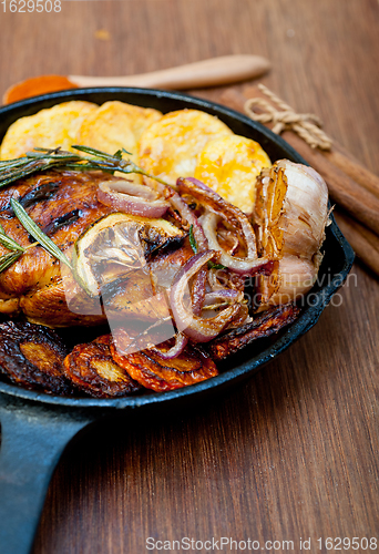 Image of roasted grilled BBQ chicken breast with herbs and spices 