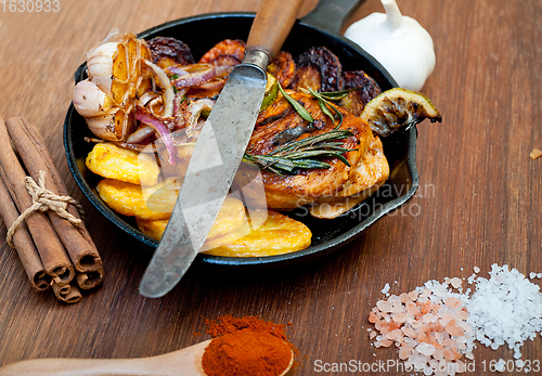 Image of roasted grilled BBQ chicken breast with herbs and spices 