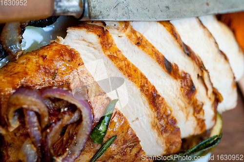 Image of roasted grilled BBQ chicken breast with herbs and spices 