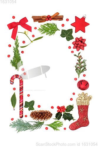 Image of Christmas Border with Festive Symbols and Winter Greenery