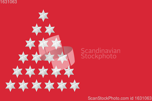 Image of Abstract Silver Star Christmas Tree on Red Background