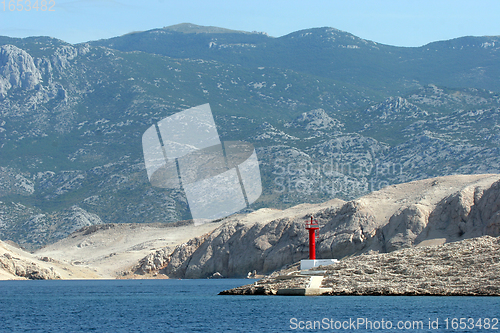 Image of Red see light on island with mountain background