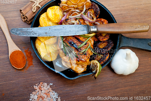 Image of roasted grilled BBQ chicken breast with herbs and spices 
