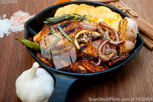 Image of roasted grilled BBQ chicken breast with herbs and spices 