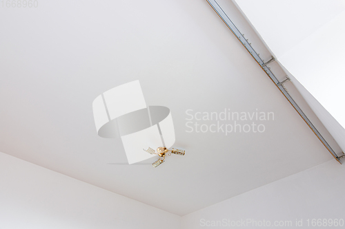 Image of White plastered ceiling in the interior of the room