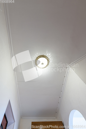 Image of Plastered and white painted ceiling in the hallway