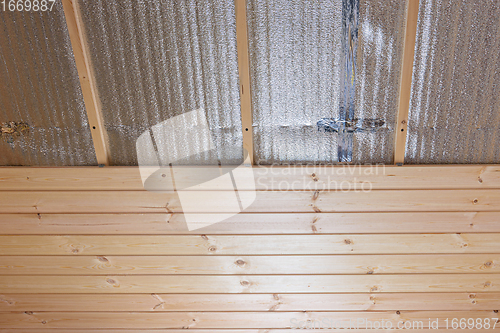 Image of Decorating the ceiling of the room with clapboard, the ceiling is insulated with insulation