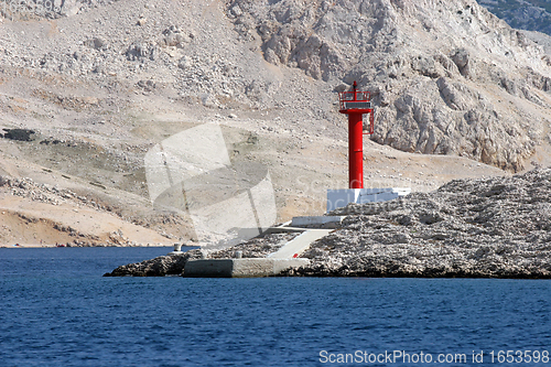 Image of Red see light on island with mountain background