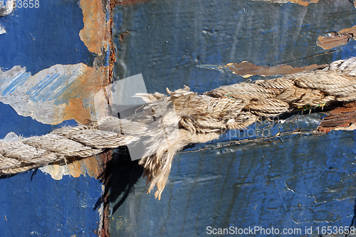 Image of Close-up of line holding boat to shore